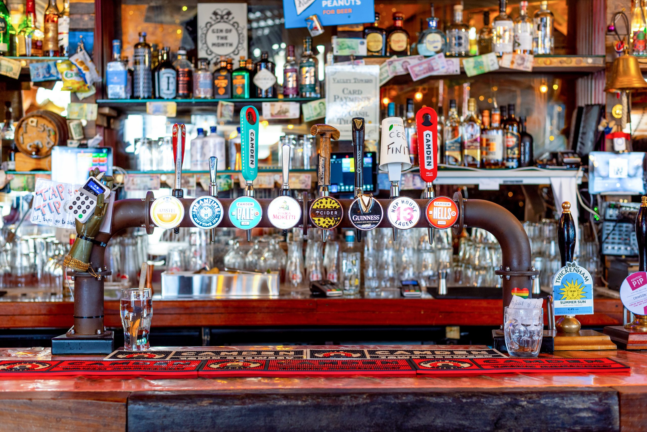 image of a bar displaying beer tap 