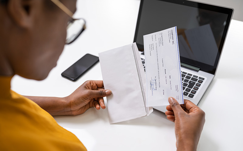 Employee looking at pay stub