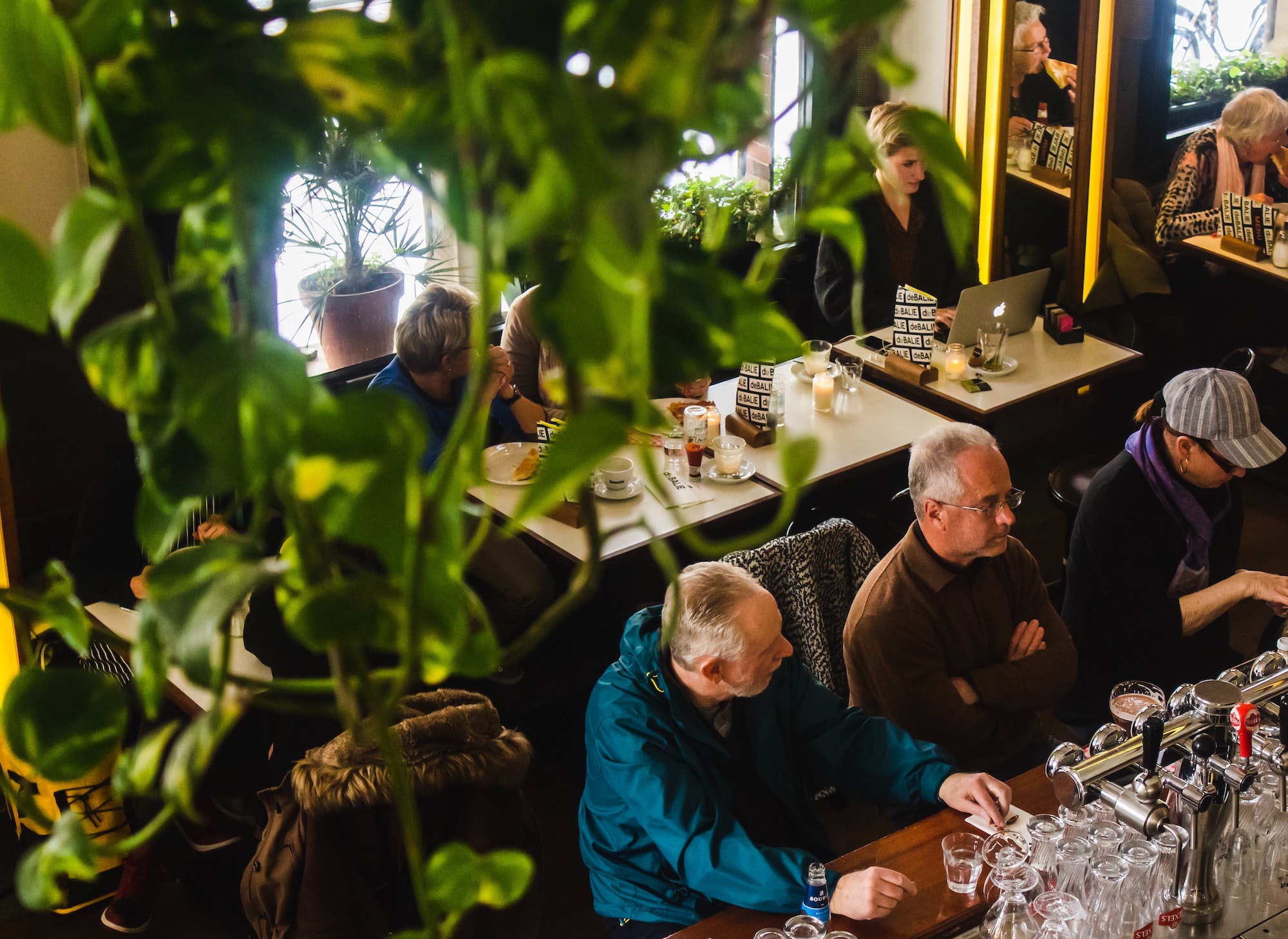 Overhead shot of customers in a restaurant dining room