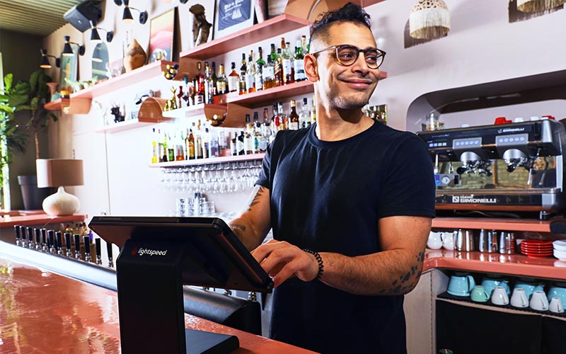 Bartender processing a transaction