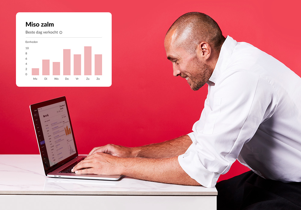 Grafiek met best verkochte gerechten, chef aan MacBook.